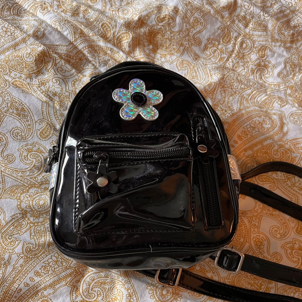 Delia’s baby backpack holographic